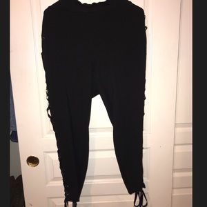 Torrid leggings with ribbon on sides.